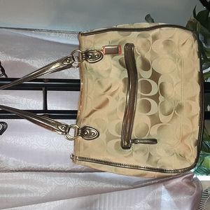 Authentic large gold coach purse with cover sack